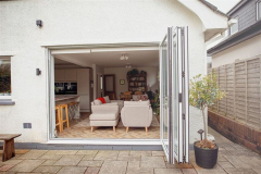 Trifold doors open to lounge